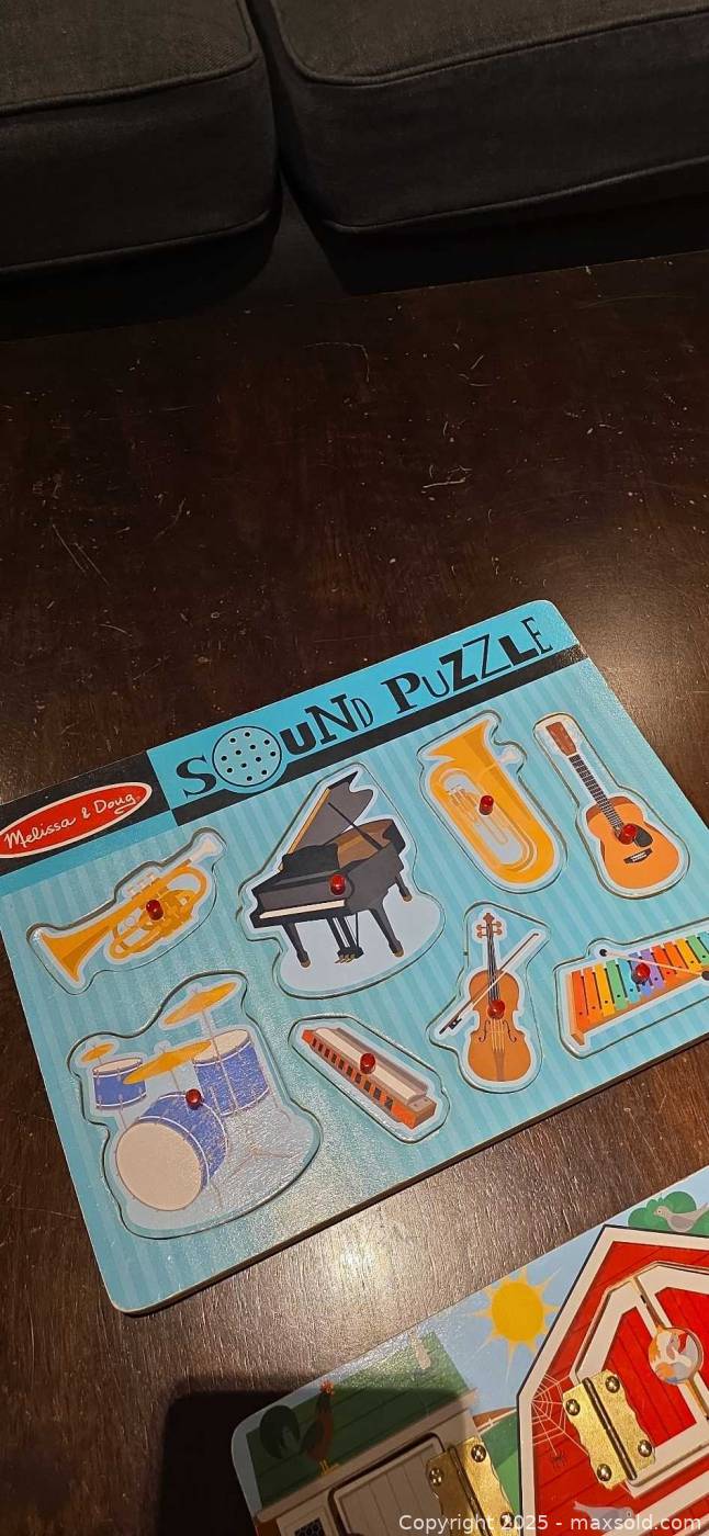 Melissa & Doug farm latch board & sound puzzle | Maxsold