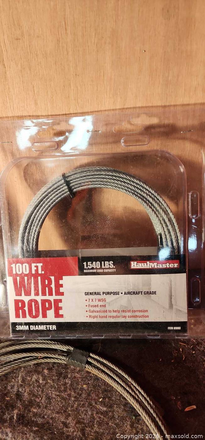 HaulMaster 100 ft wire rope, pulley and loose cable | Maxsold