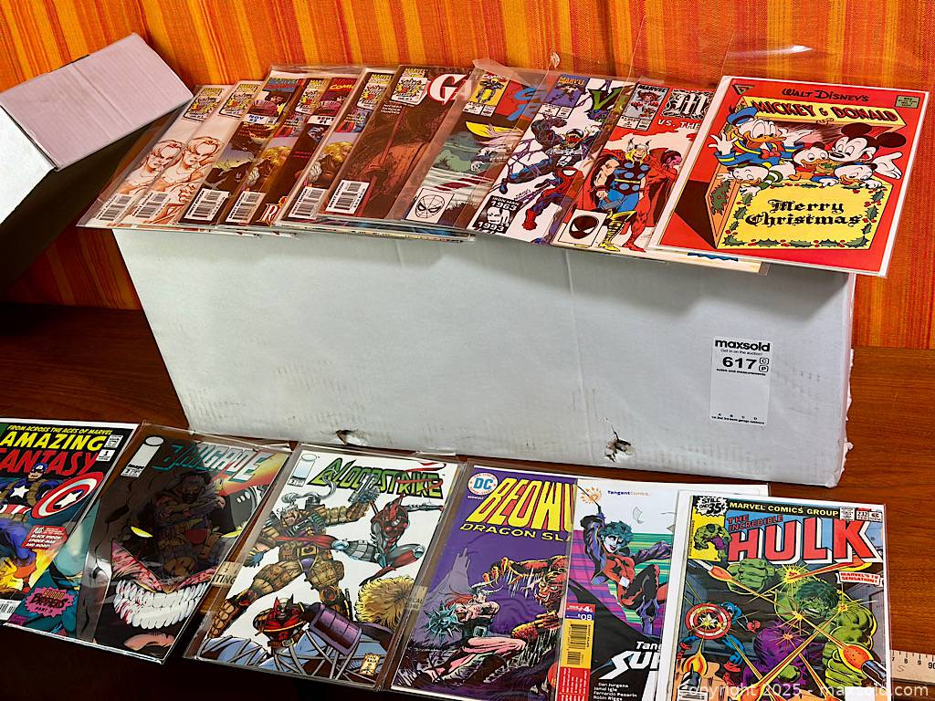 Long comic box with 200+ vintage comics | Maxsold