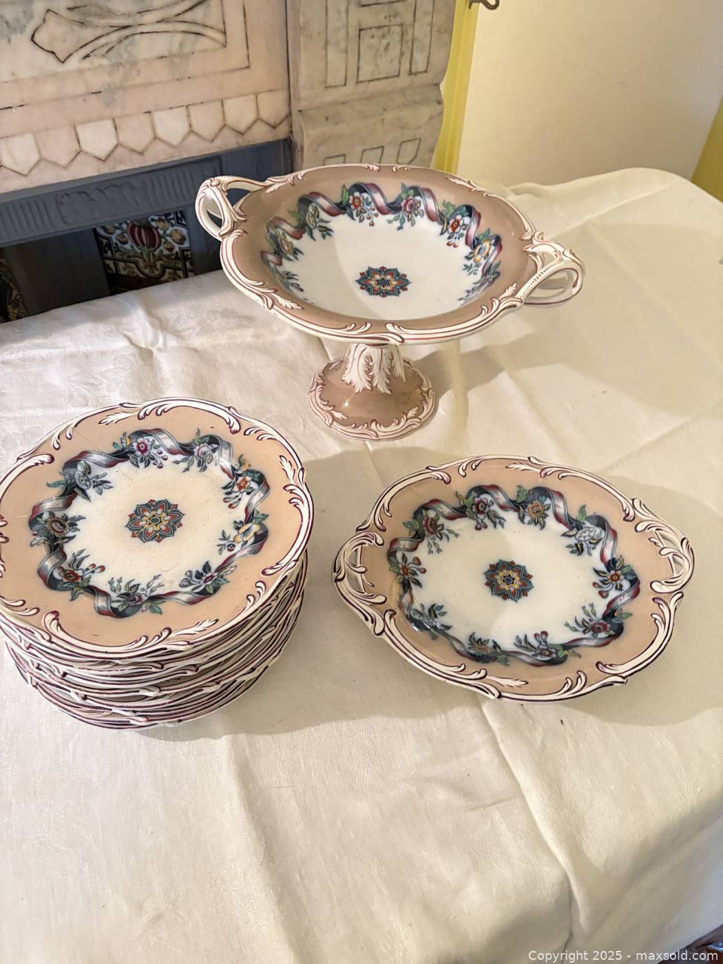 Matching Plate Porcelain pedestal compote and ten matching plates | Maxsold