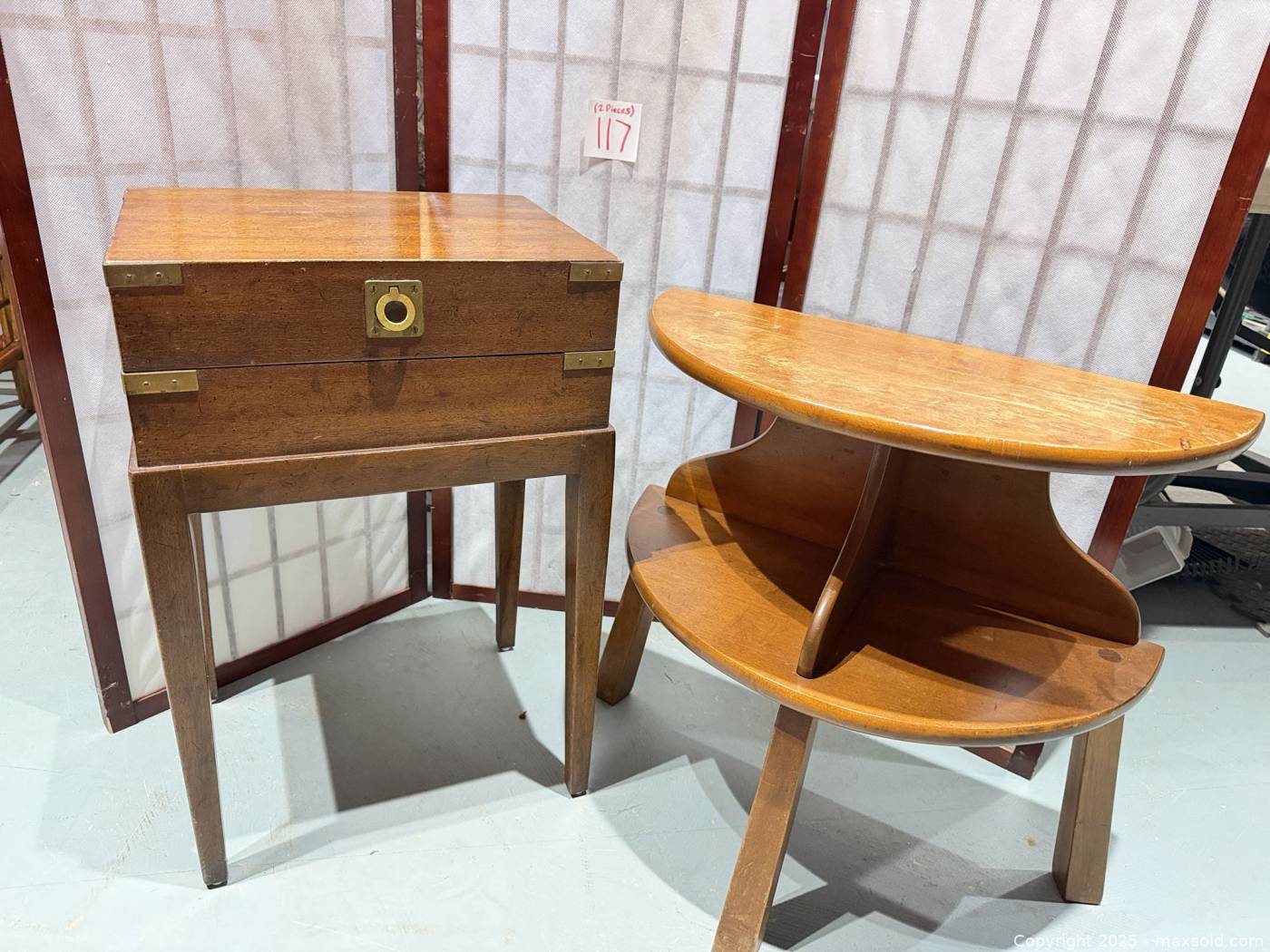 Campaign chest on stand and two-tier demilune table | Maxsold