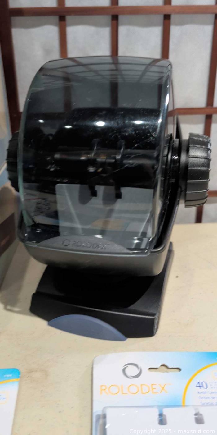 Metal lockbox, check file, rotary Rolodex, refills, tape, magnets | Maxsold