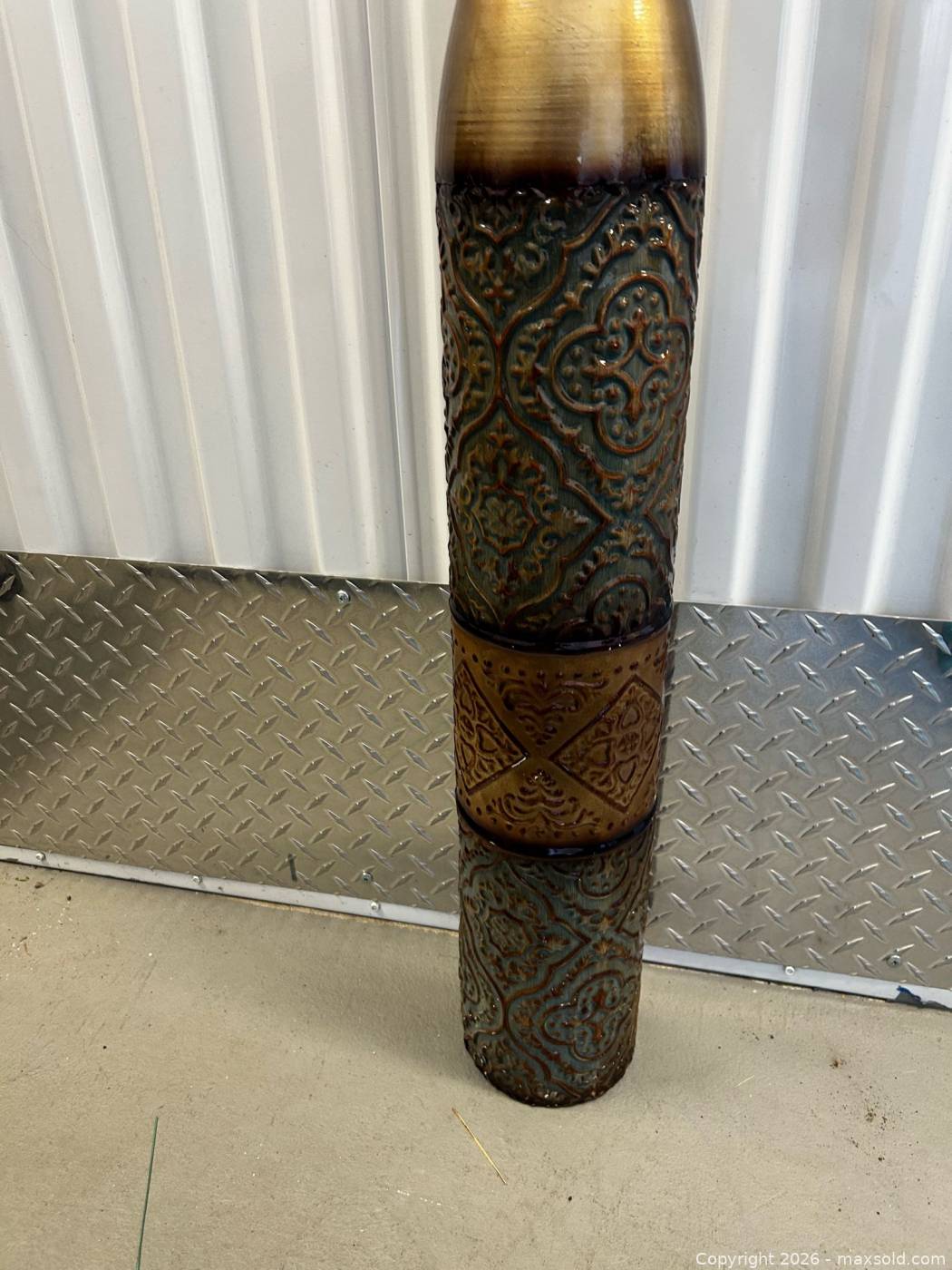 Canvas floral art, green crackle glass bottle and tall embossed metal ...