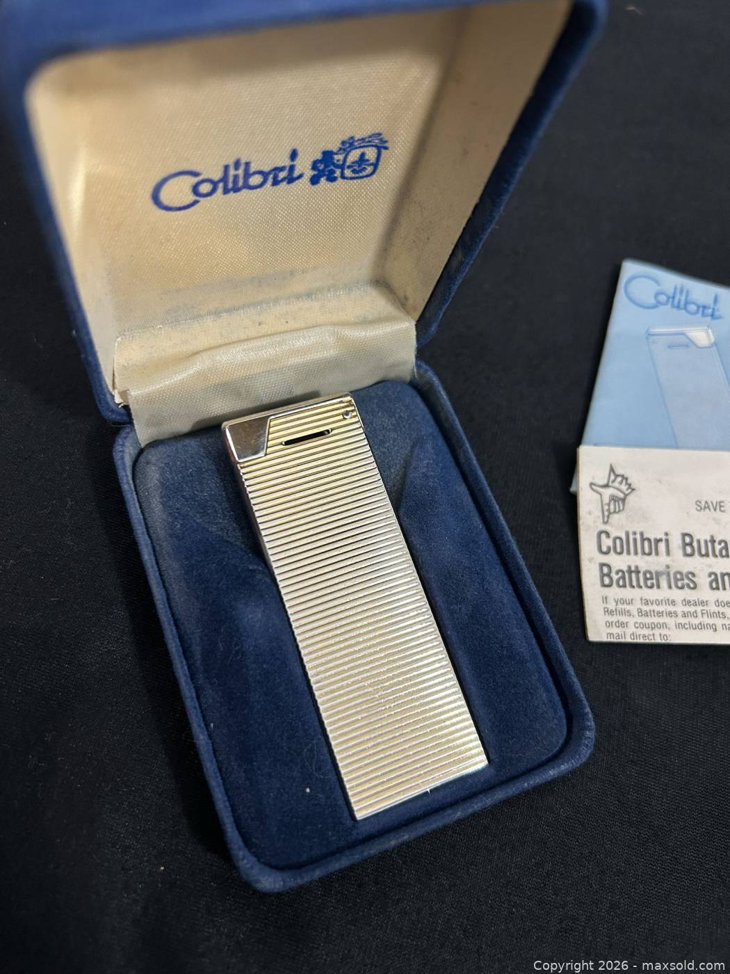 Colibri Gold Ruler Colibri gold-tone butane pocket lighter with box | Maxsold