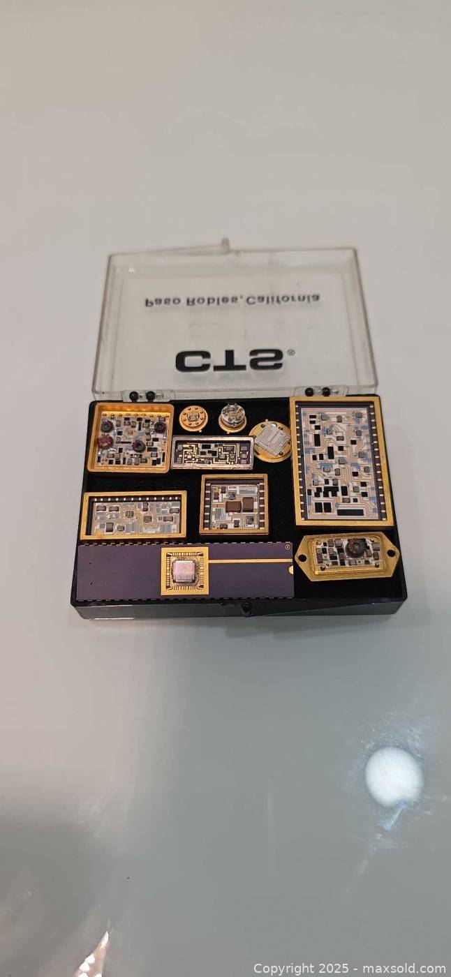 Extractor Cts Module CTS electronic hybrid modules and die samples in display case | Maxsold