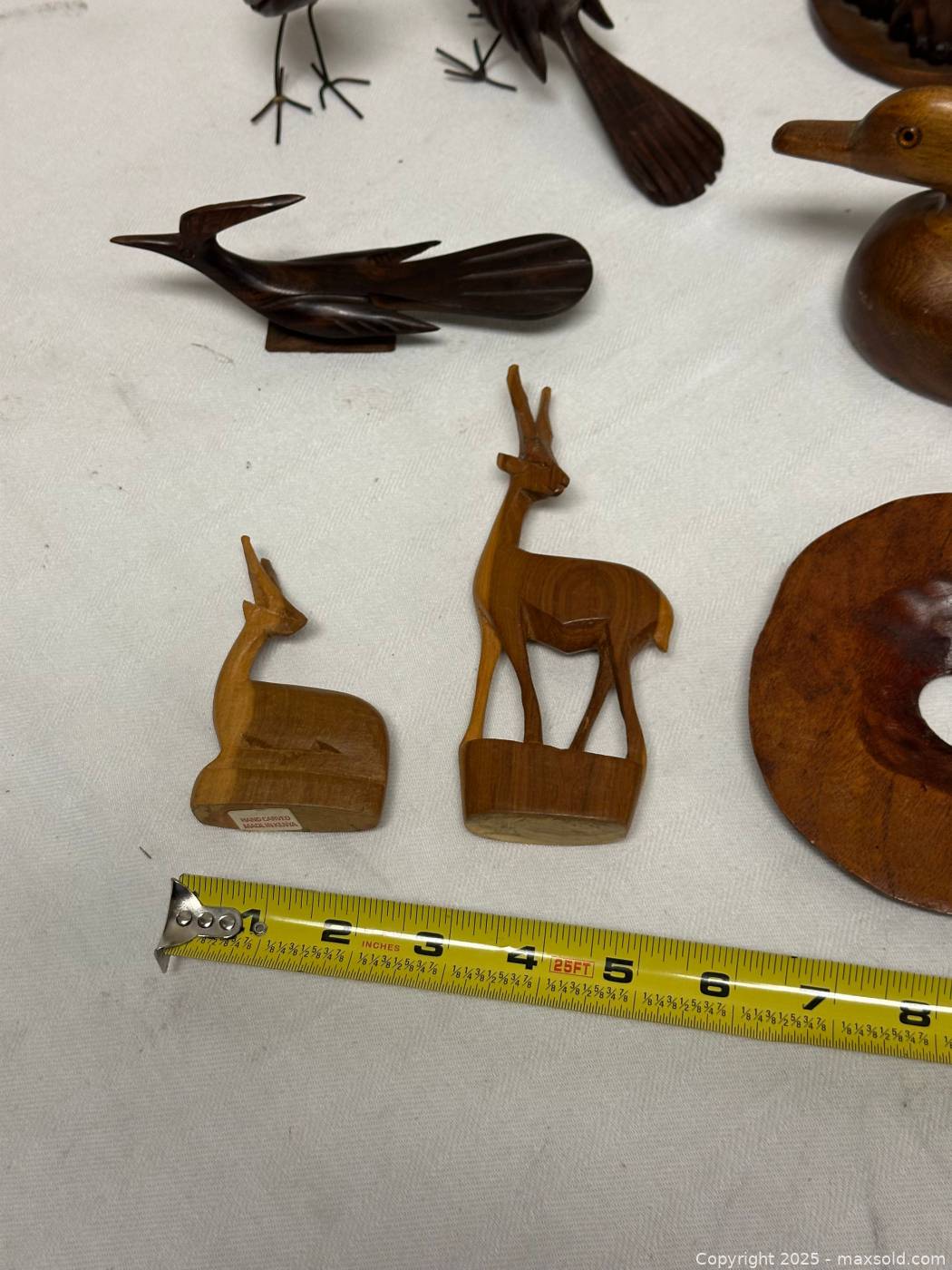 Carved wooden animal figurines and bowl | Maxsold