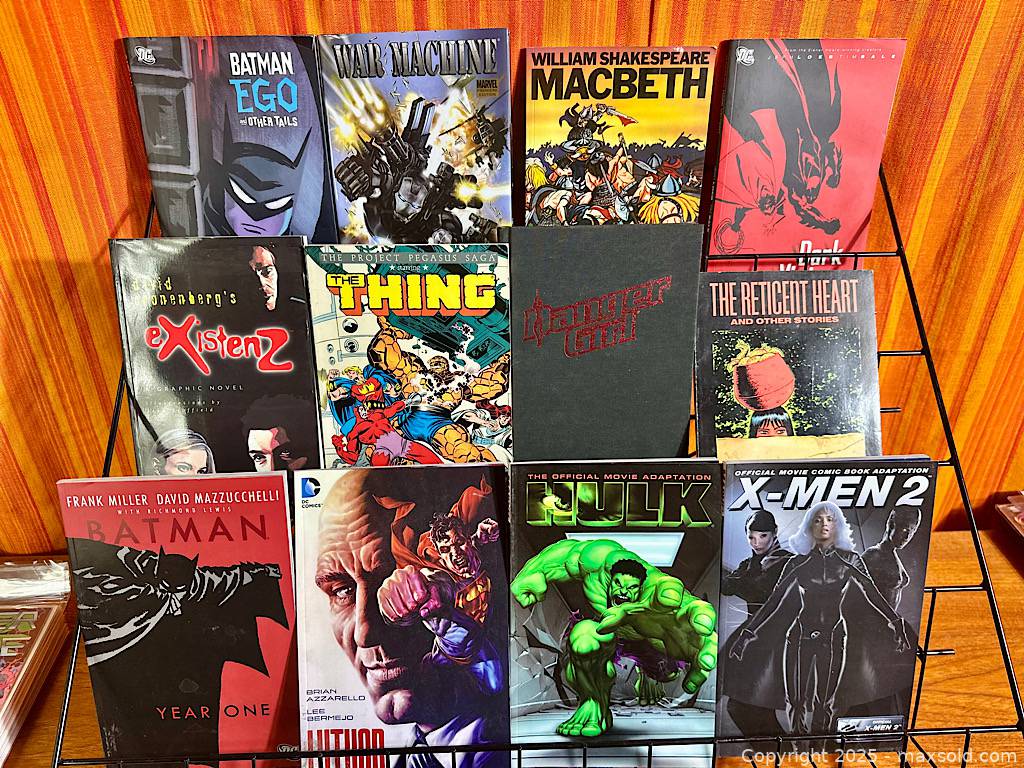 Comic long box with 24 issues & trades | Maxsold