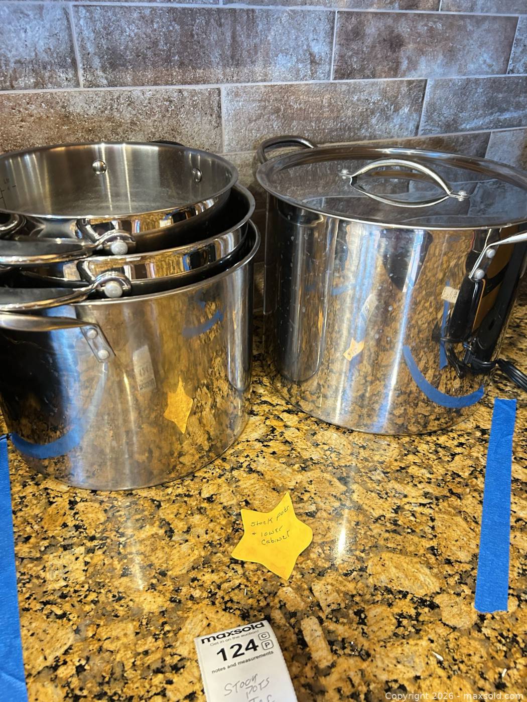 Stainless steel cookware and cast iron skillet | Maxsold