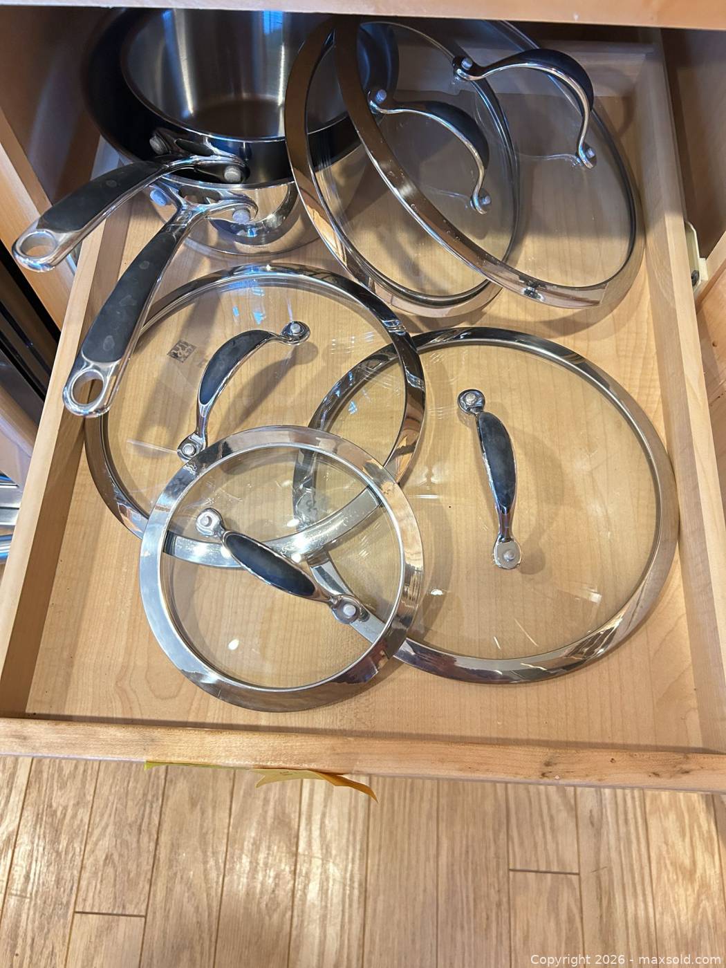 Stainless steel cookware and cast iron skillet | Maxsold