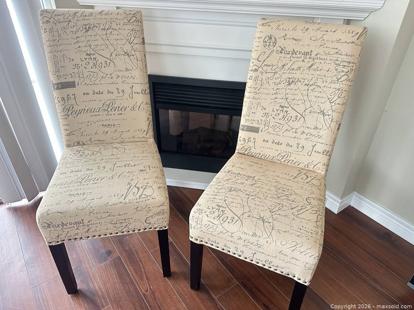 Upholstered script-print dining chairs | Maxsold