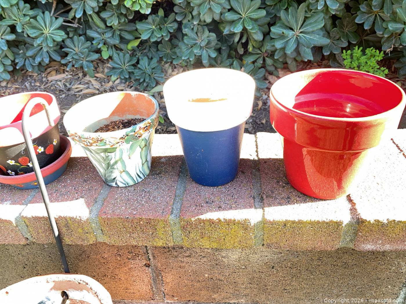 Painted pottery planters and terracotta wall art | Maxsold