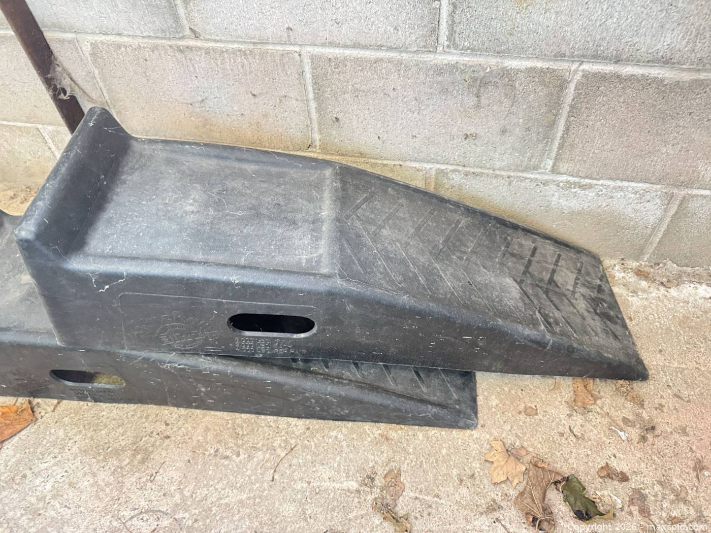 Pair black plastic car ramps 35