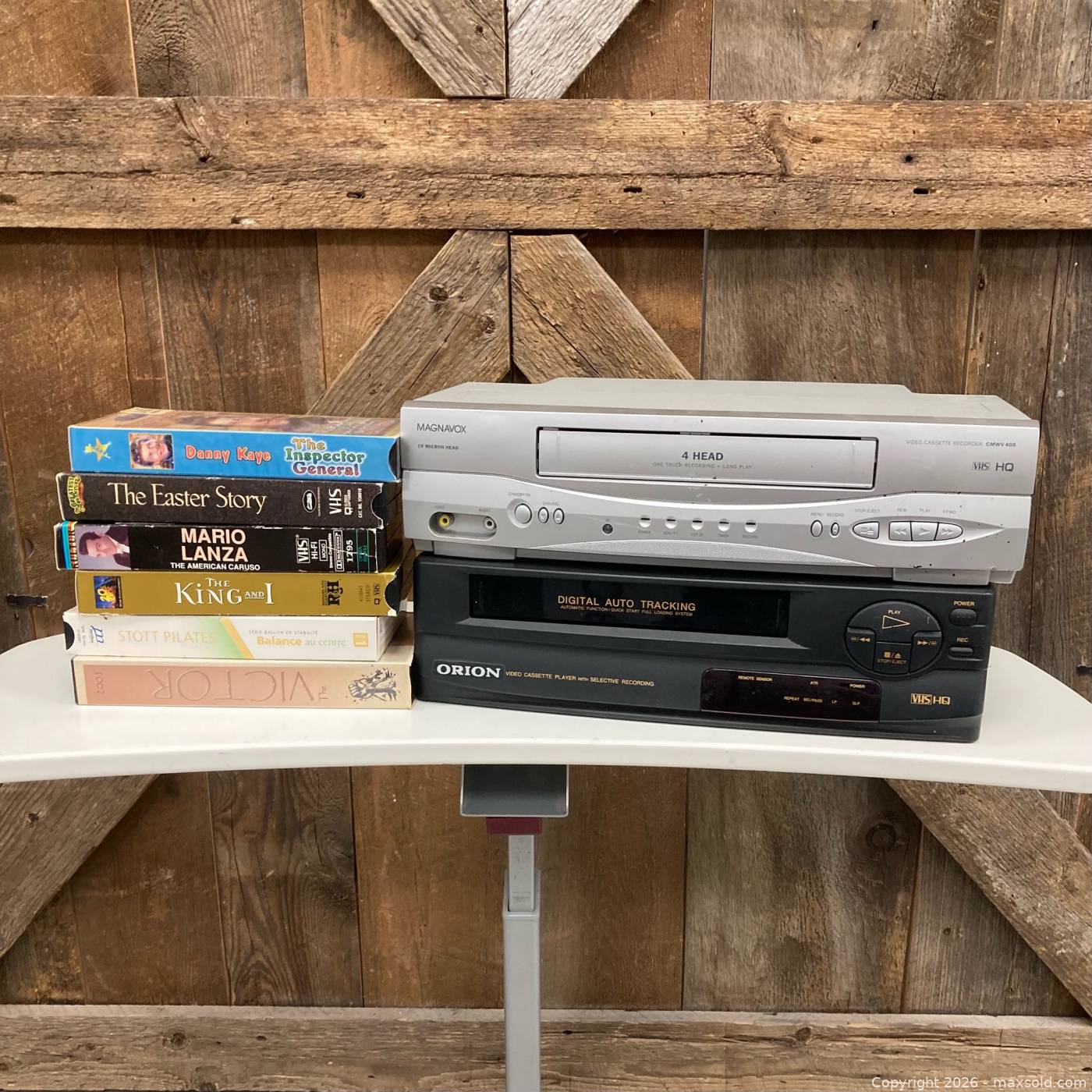 Magnavox and Orion VCRs with 6 VHS tapes | Maxsold