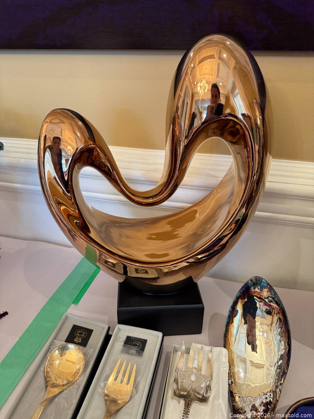 Pair abstract metal sculptures with 9 antique flatware pieces | Maxsold