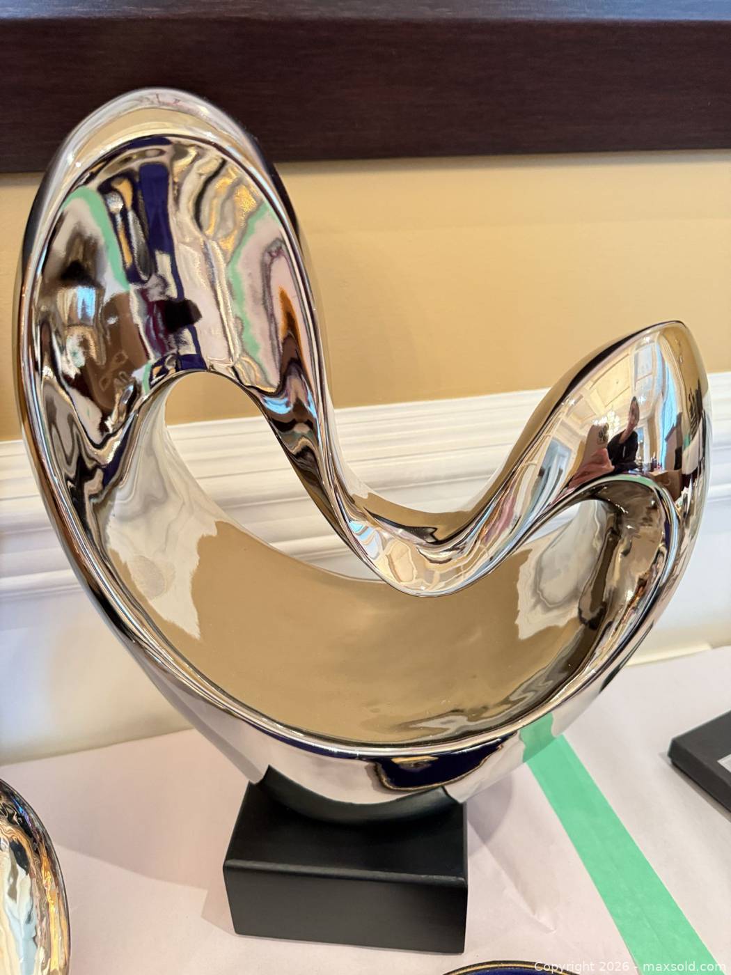 Pair abstract metal sculptures with 9 antique flatware pieces | Maxsold