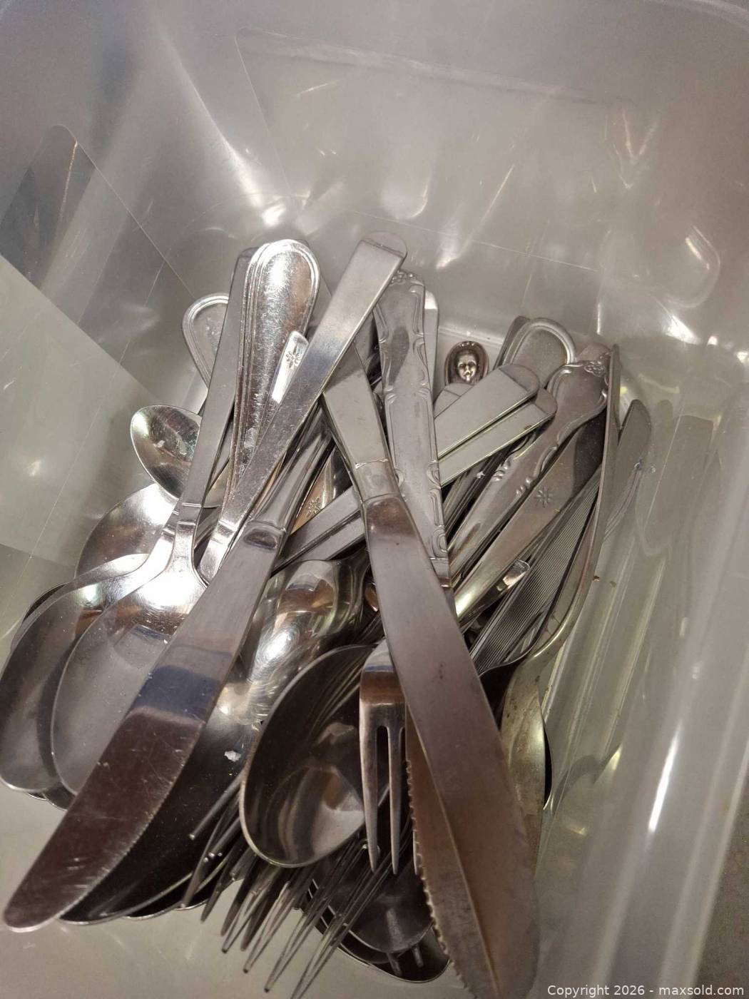 Assorted kitchen utensils and flatware | Maxsold