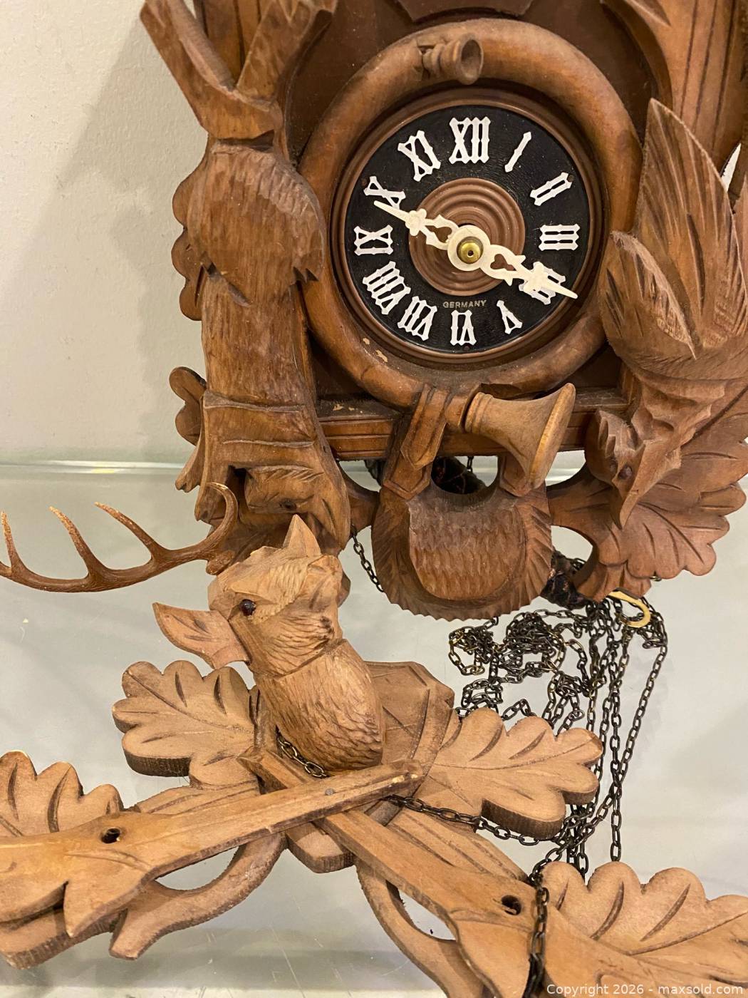 Vintage West German carved wood cuckoo clock | Maxsold