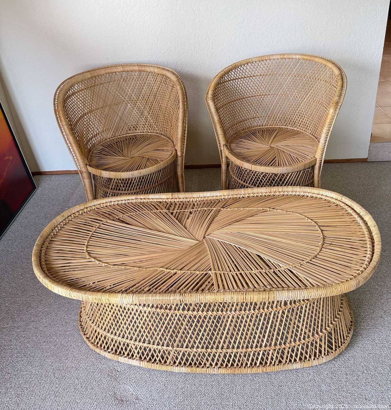 Rattan barrel chairs with matching oval coffee table | Maxsold