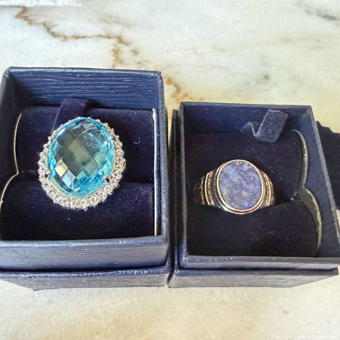 Stauer sterling rings, blue halo & purple cab | Maxsold