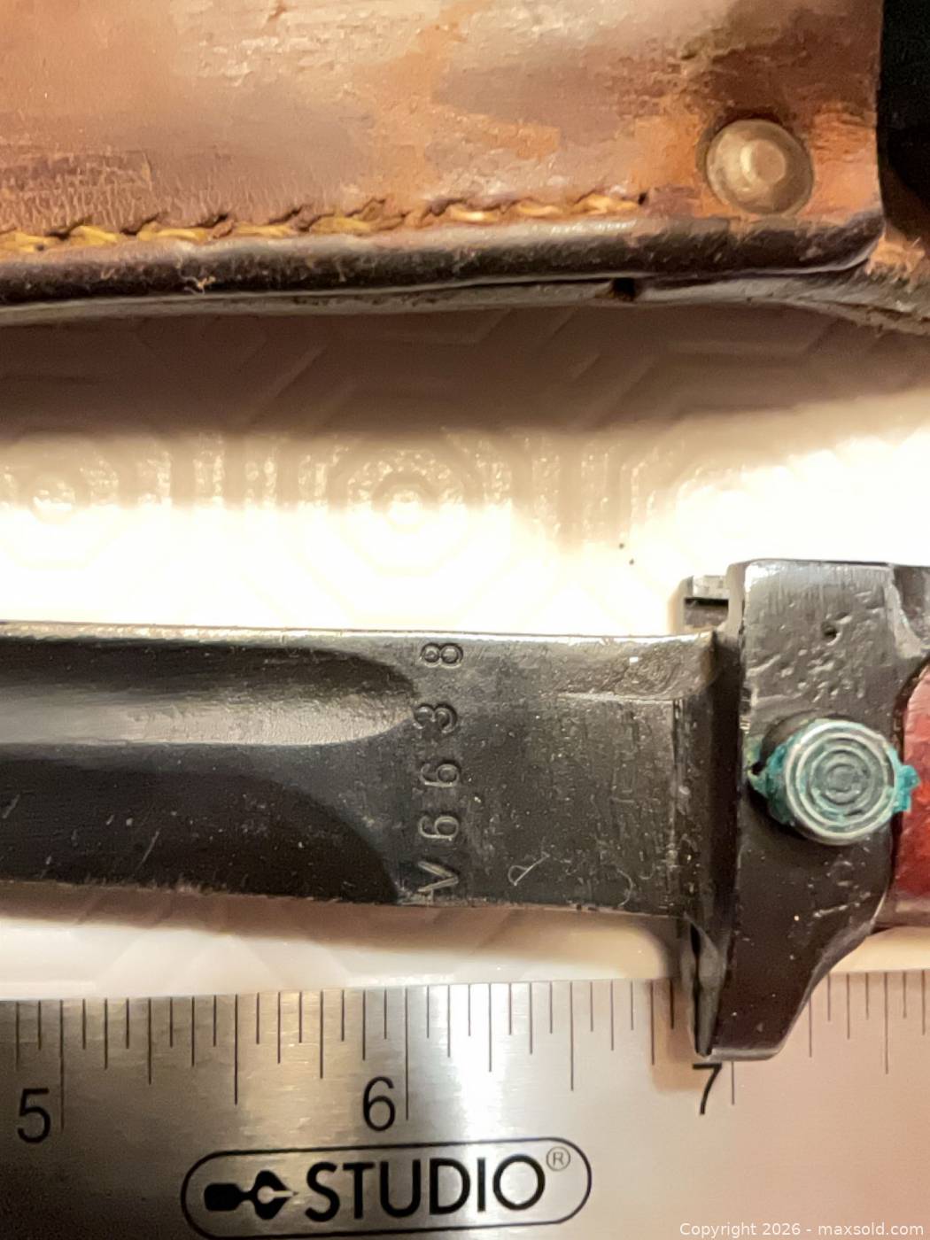 Two daggers with scabbards | Maxsold