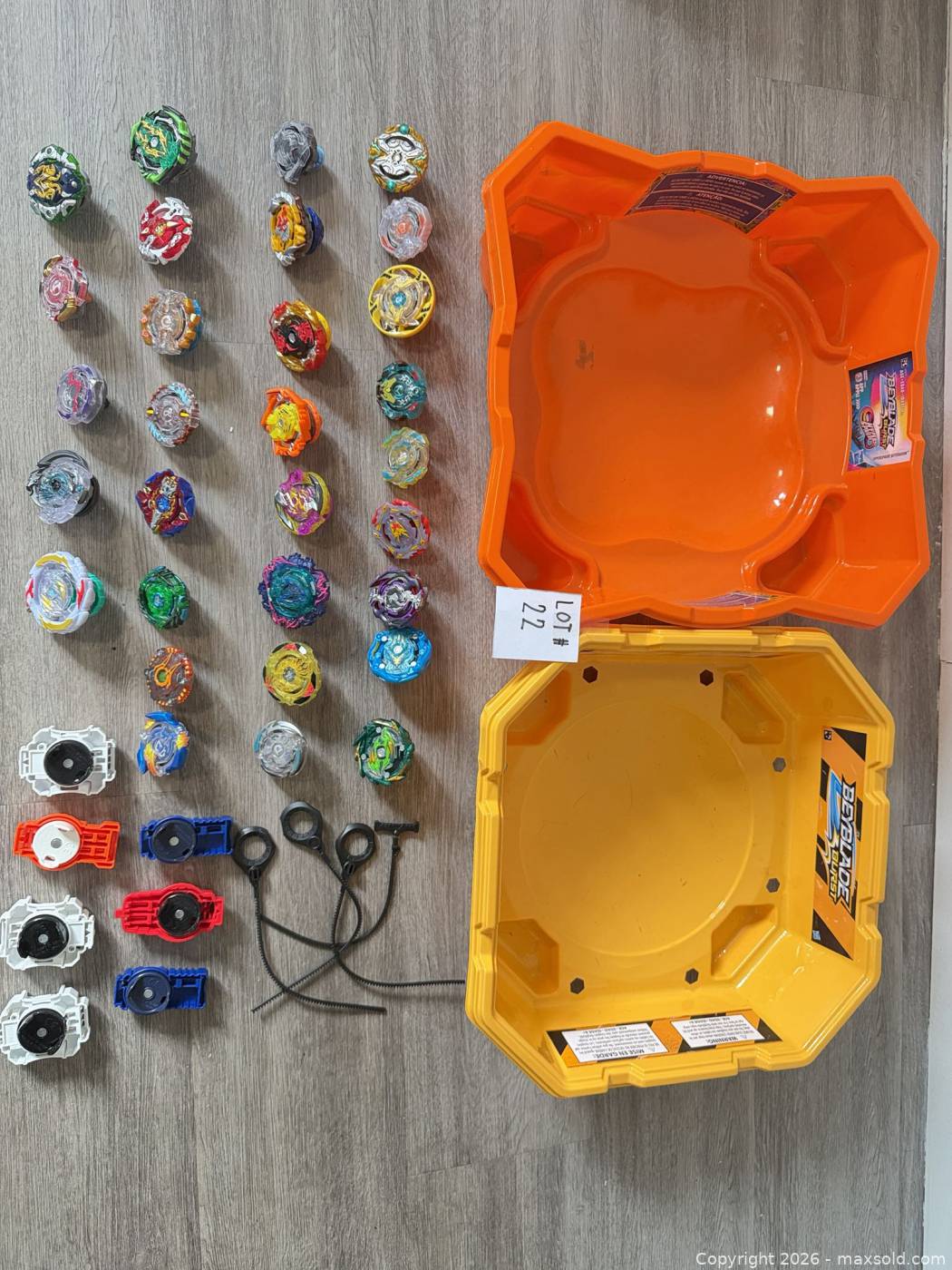 Beyblade Collection With 4 BeyStadium And 30 Tops | Maxsold