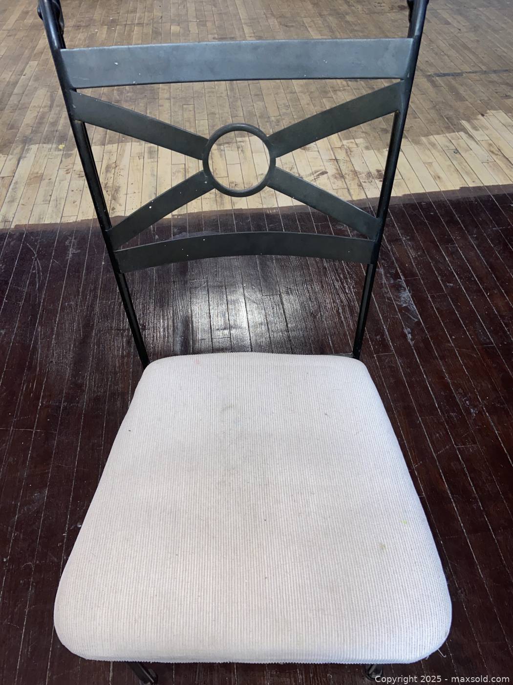 Metal dining chair with upholstered seat | Maxsold