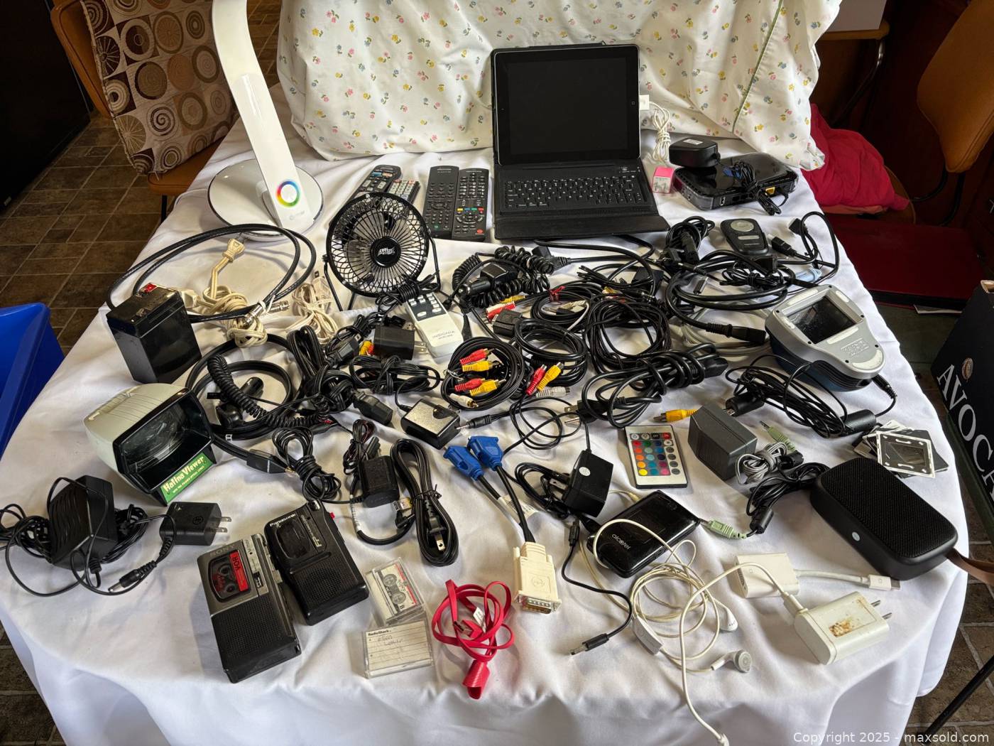 Assorted electronics with microcassette recorders, iPad, laptop, lamp ...